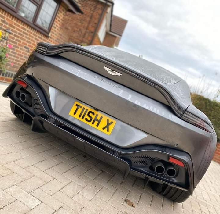 Aston martin car showing our registration plate